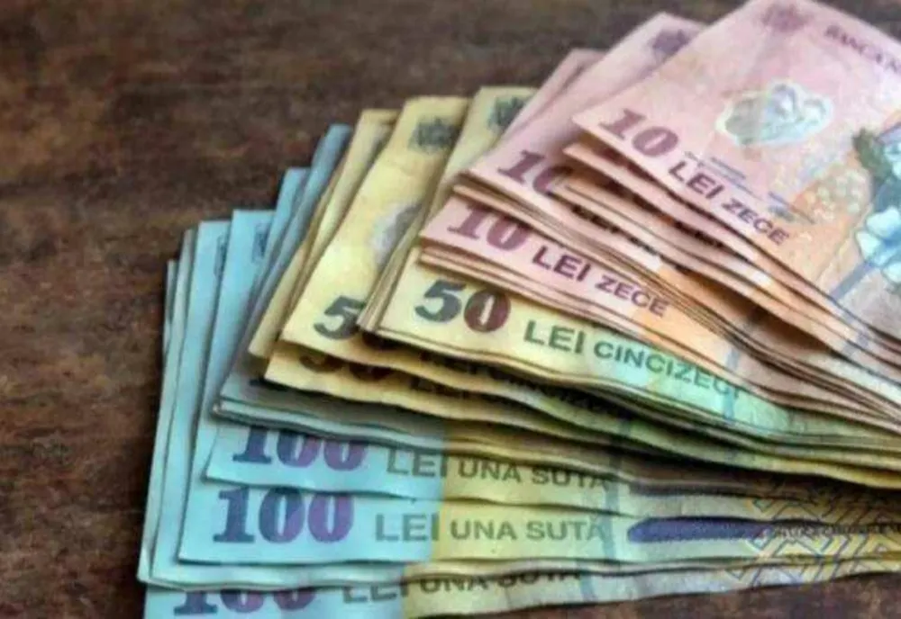 LEUL S-A DEPRECIAT ÎN FAȚA EURO ȘI A DOLARULUI; AURUL, LA O NOUĂ VALOARE-RECORD, DE 430,9 LEI