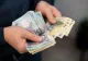 INS: Salariul mediu net a scăzut în luna mai